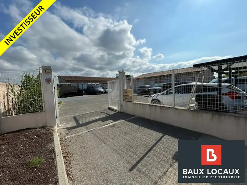 A VENDRE LOCAL D ACTIVITE EN EXCELLENT ETAT AVEC PARKING
